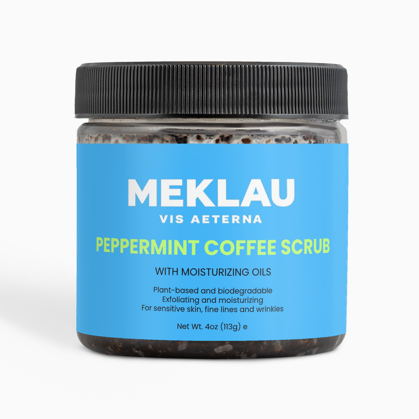 A jar of Meklau Vis Aeterna Peppermint Coffee Scrub with a bright blue label and black lid, set against a clean white background.