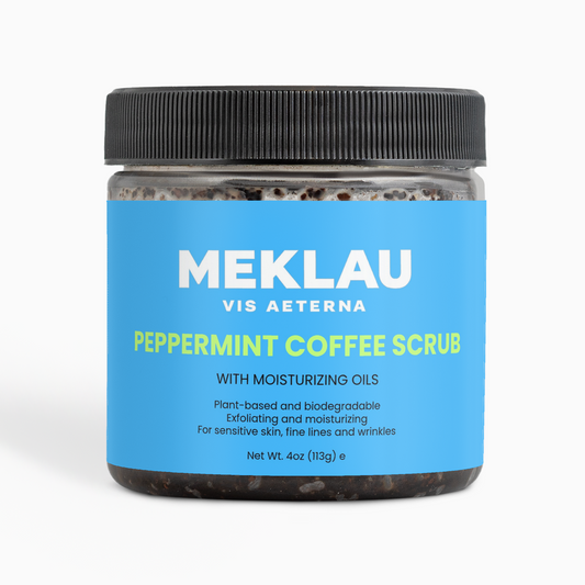 A jar of Meklau Vis Aeterna Peppermint Coffee Scrub with a bright blue label and black lid, set against a clean white background.